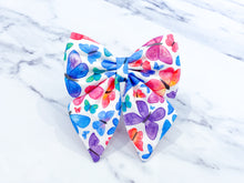 Load image into Gallery viewer, Rainbow Butterfly Dog Bow, Available in bow tie and sailor bow