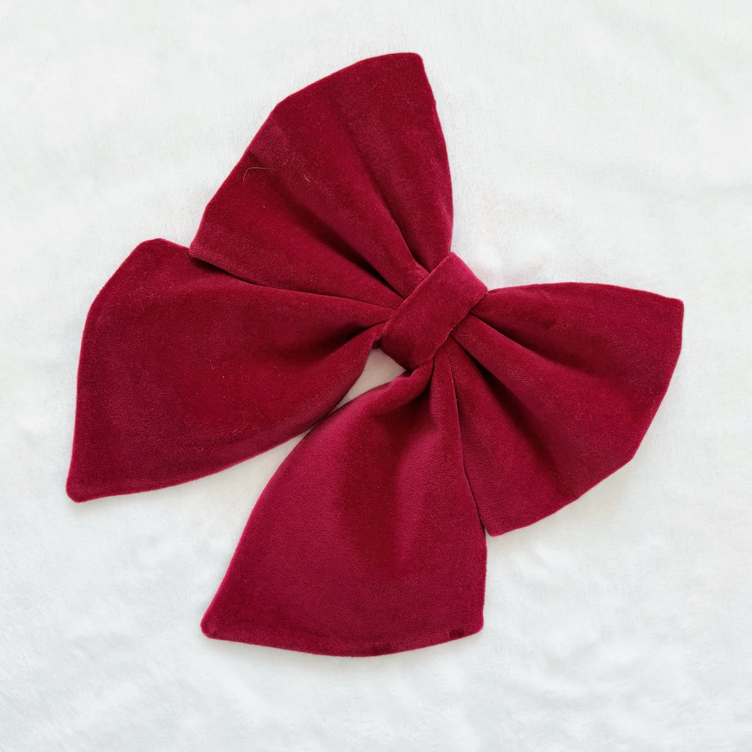 Red velvet bow, available in sailor bow and bow tie style